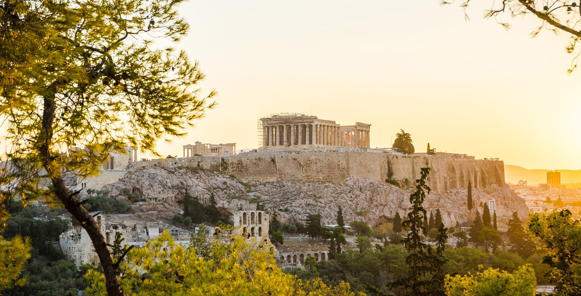 Athens, Greece -- Acropolis and the Parthenon above the city at golden hour